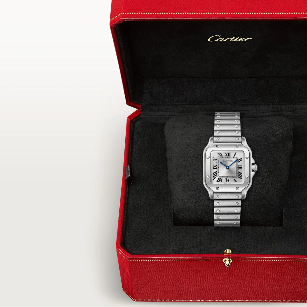 Cartier Santos Uhr Luxuriöse Armbanduhr in rotem Karton präsentiert, zeigt edlen Stil und Handwerkskunst.